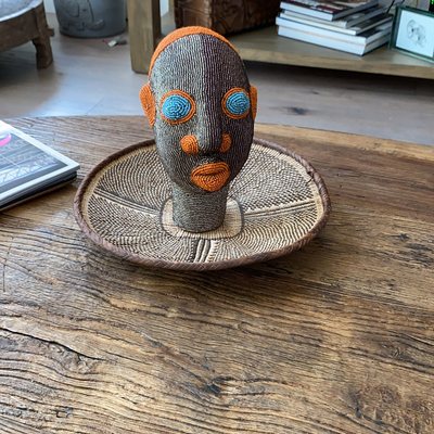 A Terra Naza beaded head in a collector home